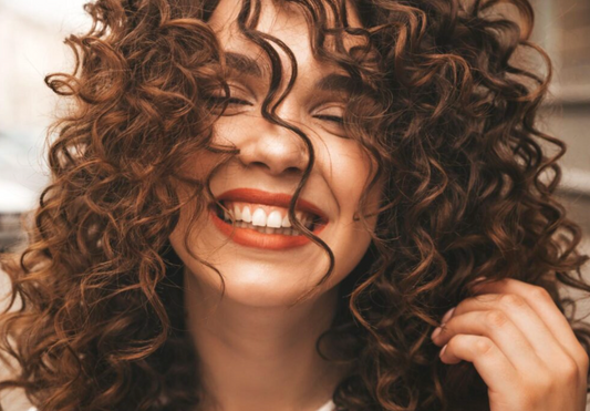 How Do You Use a Hydrating Mist to Refresh Curly Hair?