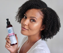 Load image into Gallery viewer, Woman with beautiful naturally curl hair holding curl ease styling lotion